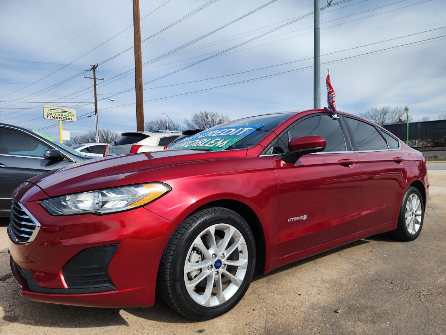 2019 RED Ford Fusion Hybrid SE (3FA6P0LU7KR) , AUTO transmission, located at 2660 S.Garland Avenue, Garland, TX, 75041, (469) 298-3118, 32.885551, -96.655602 - Welcome to DallasAutos4Less, one of the Premier BUY HERE PAY HERE Dealers in the North Dallas Area. We specialize in financing to people with NO CREDIT or BAD CREDIT. We need proof of income, proof of residence, and a ID. Come buy your new car from us today!! This is a 2019 FORD FUSION SE HYBRID - Photo#7